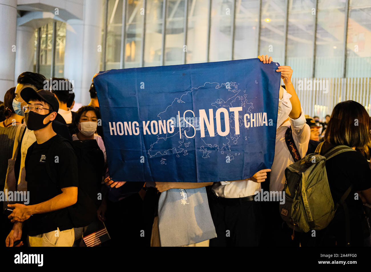 Hong Kong. 14th Oct, 2019. Protestors with Hong Kong is not China sign during Hong Kong Human Rights and Democracy Act Rally at Chater Garden in Central District Hong Kong. This rally was proposed to US lawmakers that they should pass the act that would help the Hong Kong democracy. ItÃs aimed at putting pressure on Beijing to uphold its promise to preserve Hong KongÃs autonomy. Credit: Keith Tsuji/ZUMA Wire/Alamy Live News Stock Photo