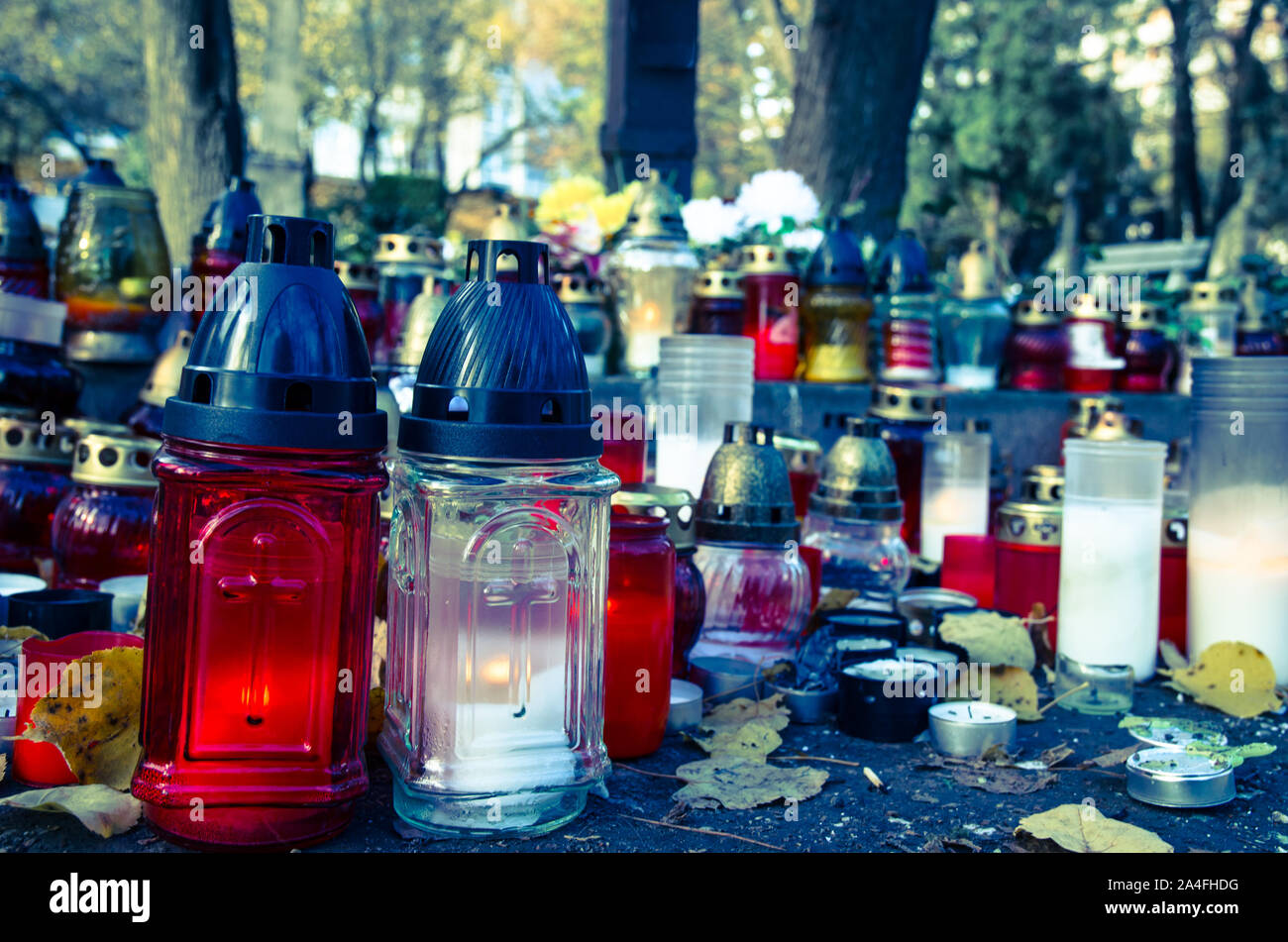 burning candles during all saints day Stock Photo Alamy