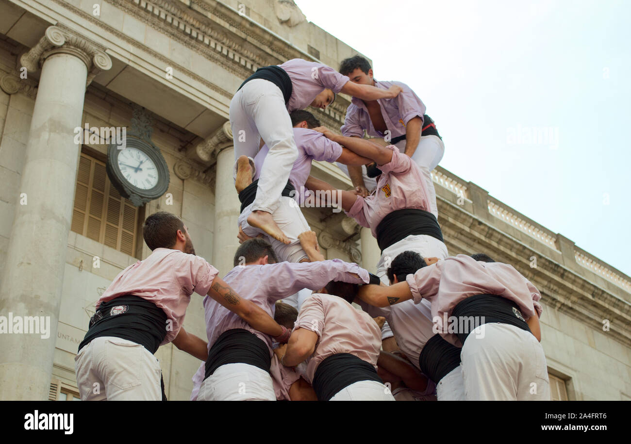 Castellers building castells/human towers at the 2019 La Merce Festival ...