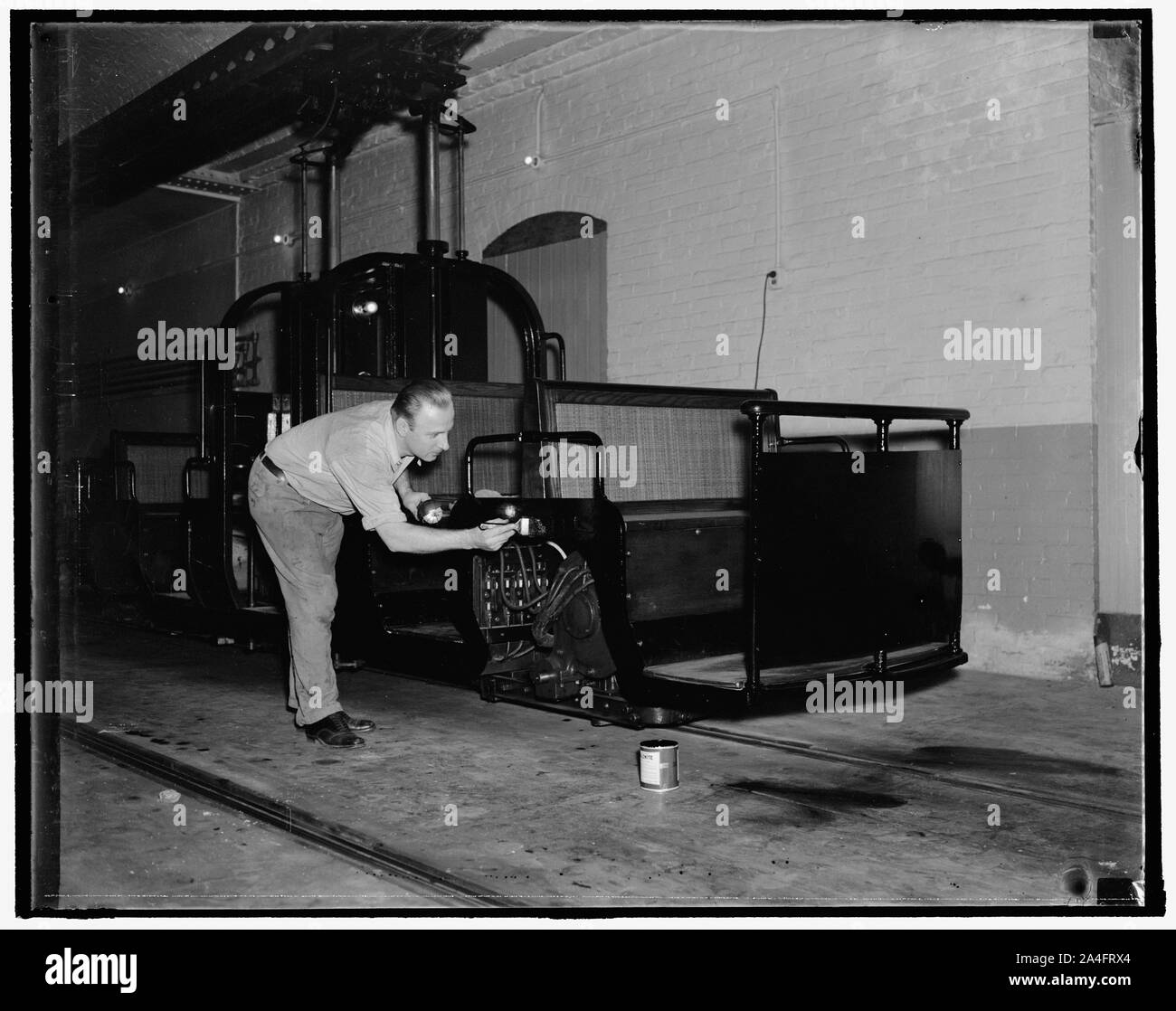 Tram cars readied for senators. Washington, D.C., Nov. 9. The tram cars used by the senators in going thru the subway from their offices to the Capitol have been given a new coat of paint and an engine overhauling in readiness for the special session November 15. 11/9/37 Stock Photo