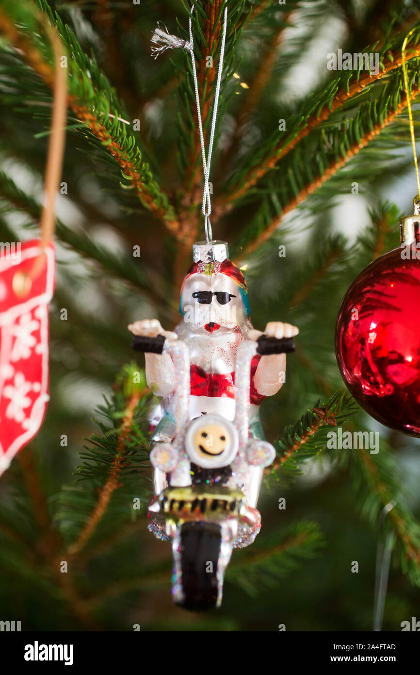 Santa on a motorcycle like Christmas decorations in a Christmas tree