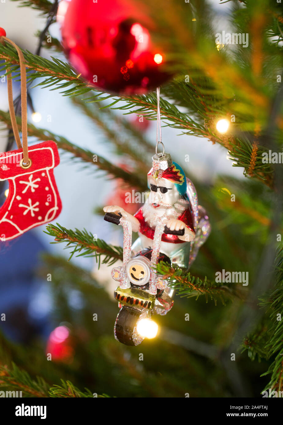 Santa on a motorcycle like Christmas decorations in a Christmas tree