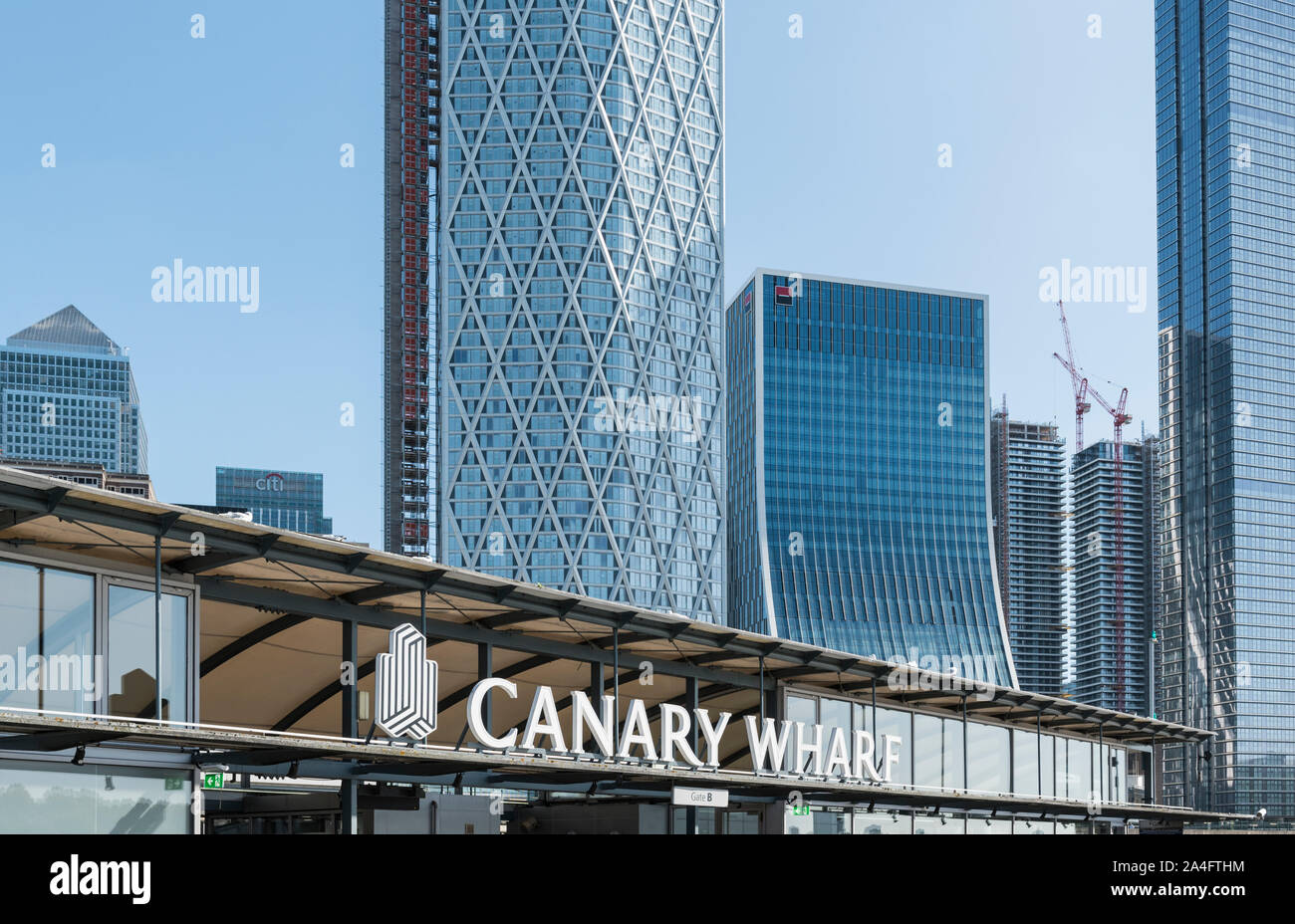 Canary Wharf sign at the pier on the River Thames Stock Photo - Alamy