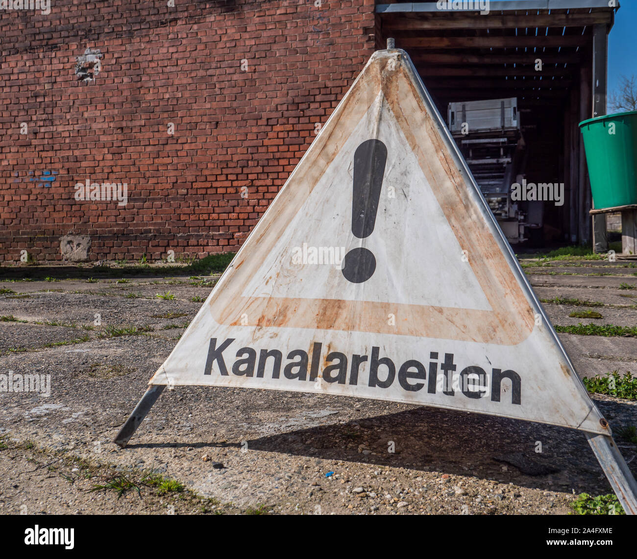 Caution Sewer work Warning sign in German Stock Photo