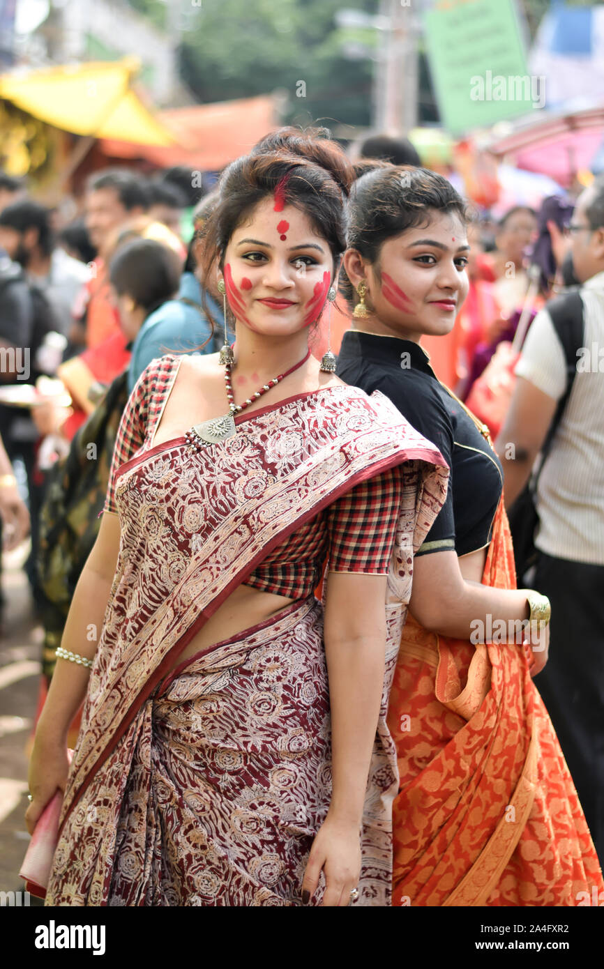 Kolkata, India – 8th October 2019; Women participate in Sindur Khela at a puja pandal on the last day of Durga puja at Baghbazar Sarbojanin in Kolkata Stock Photo