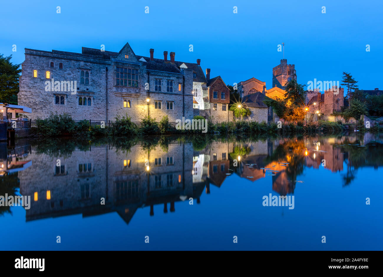 Archbishop's Palace and All Saints Church on the banks of the River Medway at dusk. Maidstone, Kent. Stock Photo