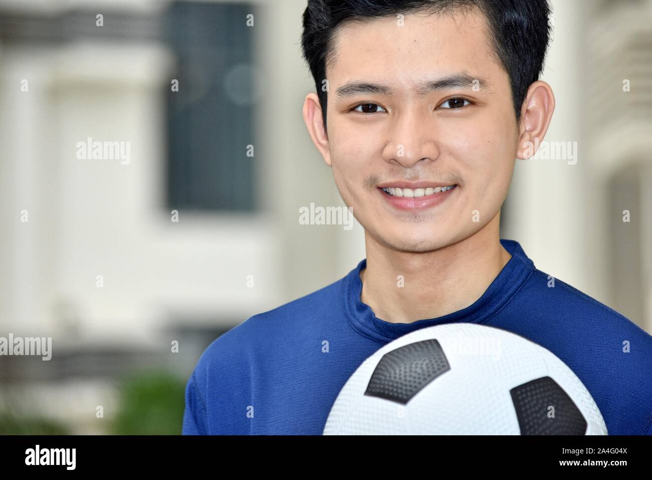 smiling-filipino-male-soccer-player-stock-photo-alamy