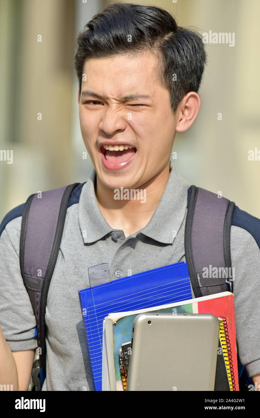 Minority Boy Student Winking Stock Photo