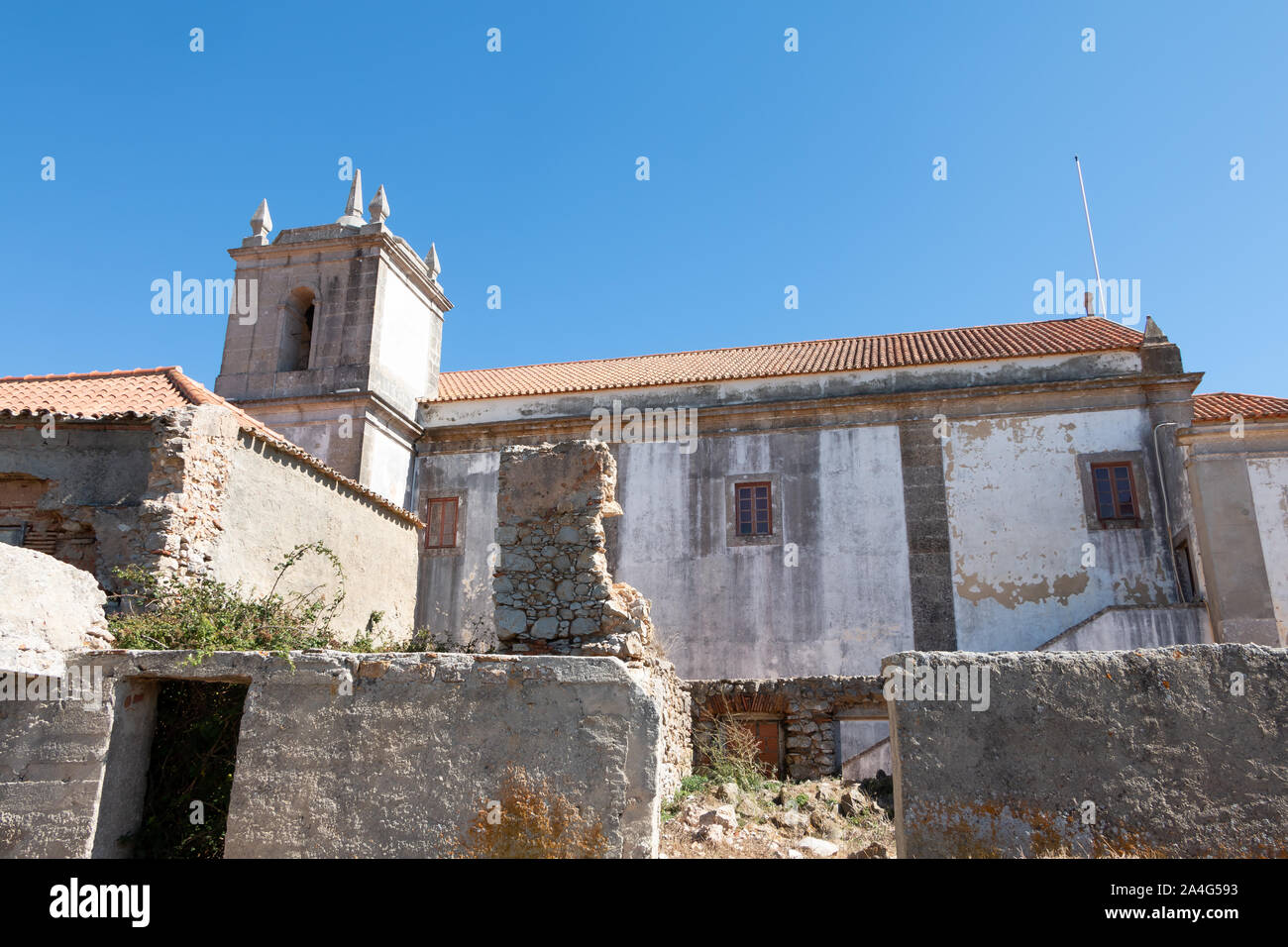 Cape Espichel near Sesimbra, Portugal - August 8, 2018: Architectural detail of the Cape Espichel sanctuary on a summer day. The Baroque church is bui Stock Photo