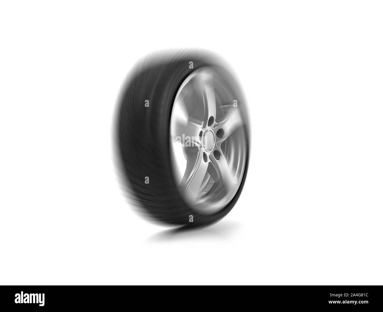 Spinning car wheel on a white background. Stock Photo