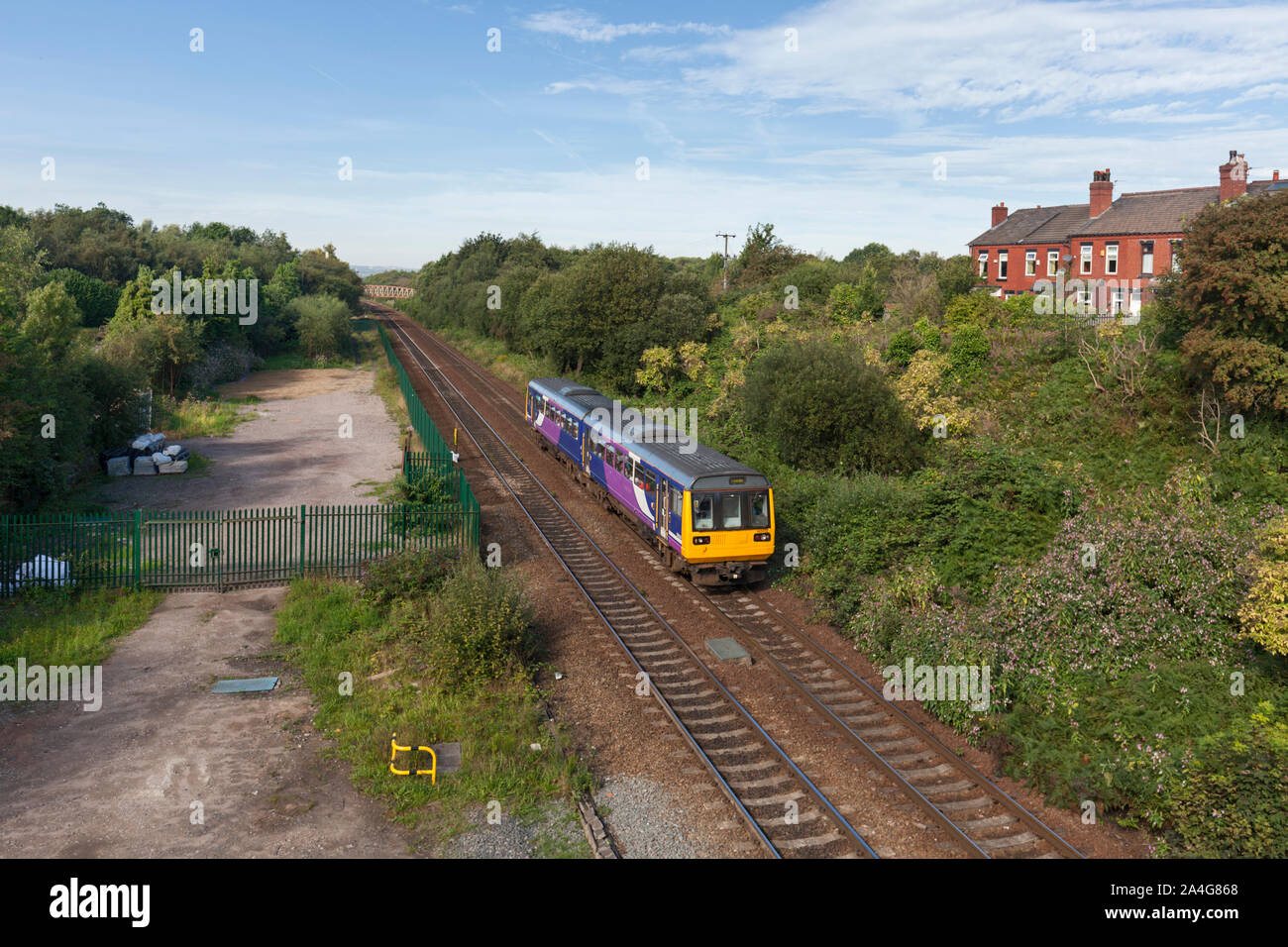 Arriva Northern rail class 142 pacer train at Hindley, Lancashire with a Southport to Leeds train Stock Photo