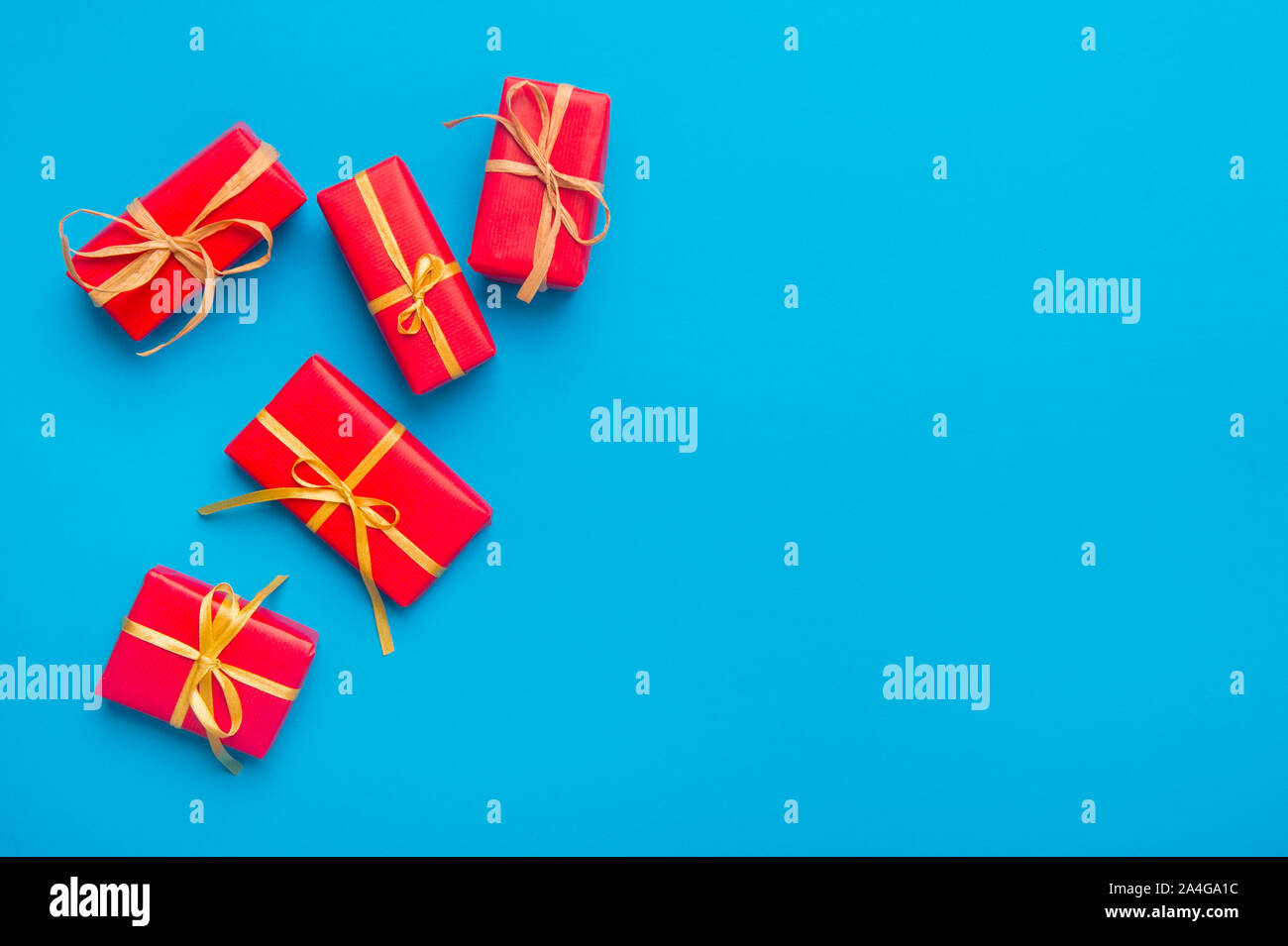 Christmas Gift Boxes Placed On Blue Background Stock Photo