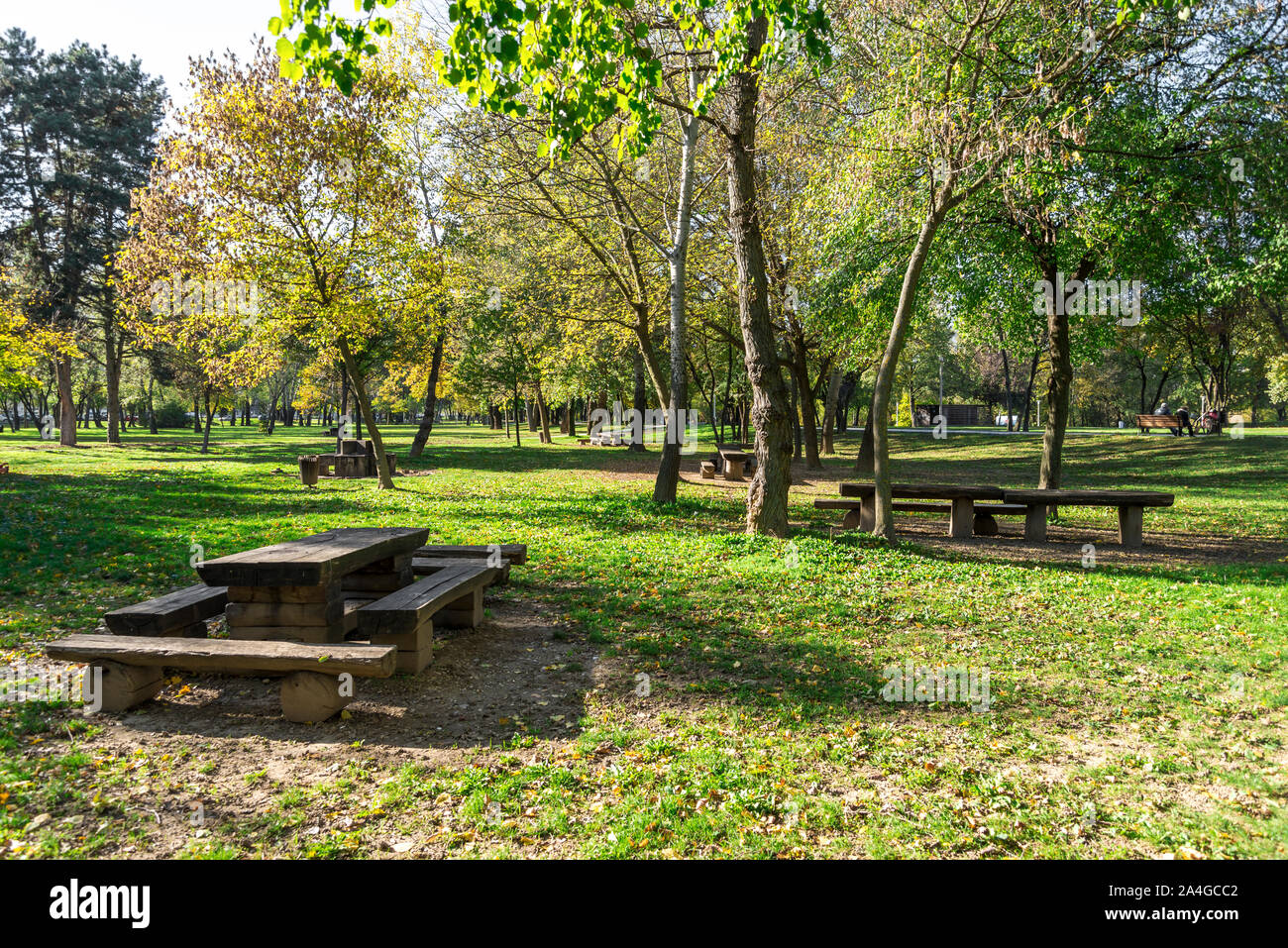 Wooden picnic tables on grass hires stock photography and images Alamy