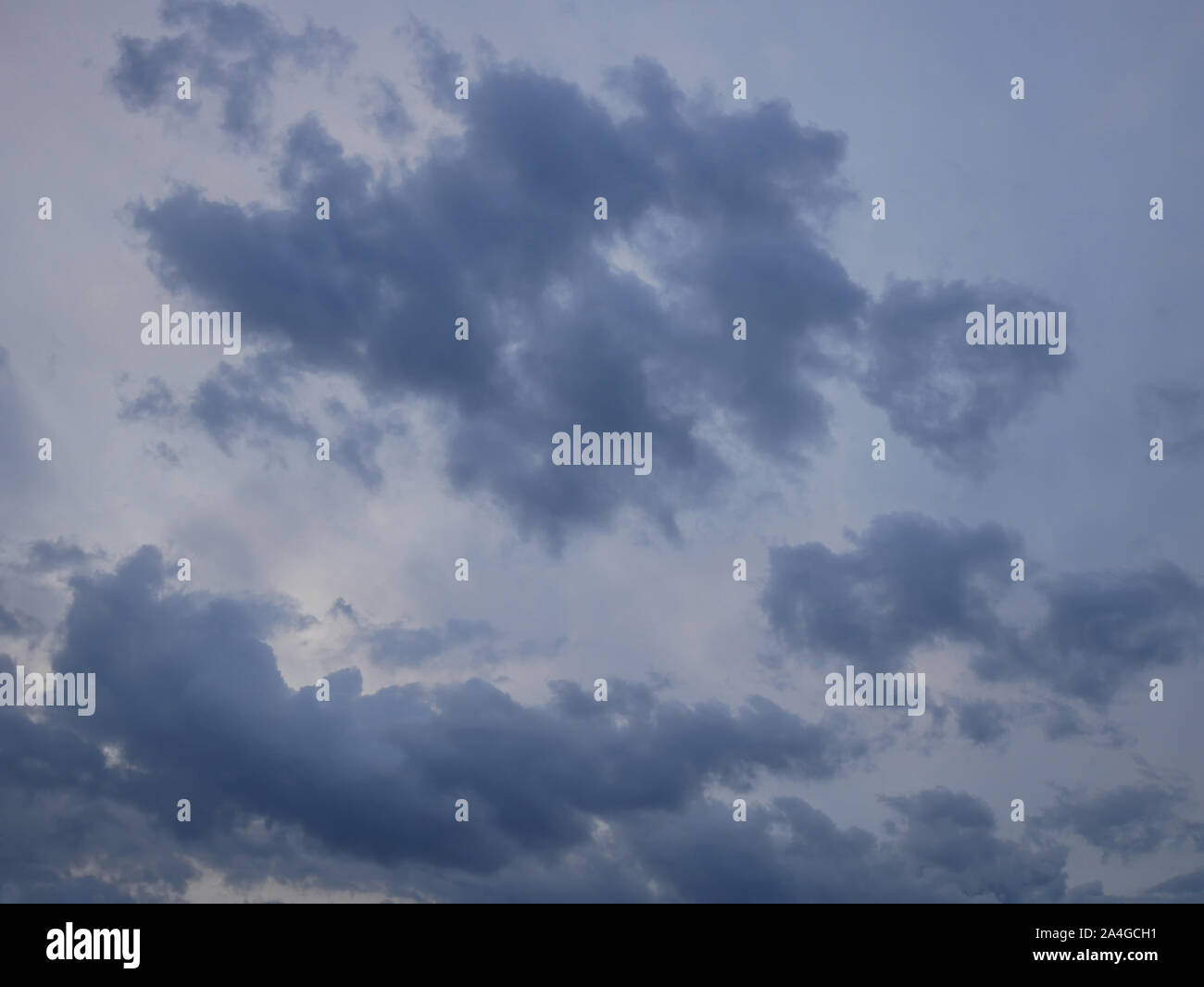 Dramatic gray and bluish cloudscape before storm in September Stock Photo