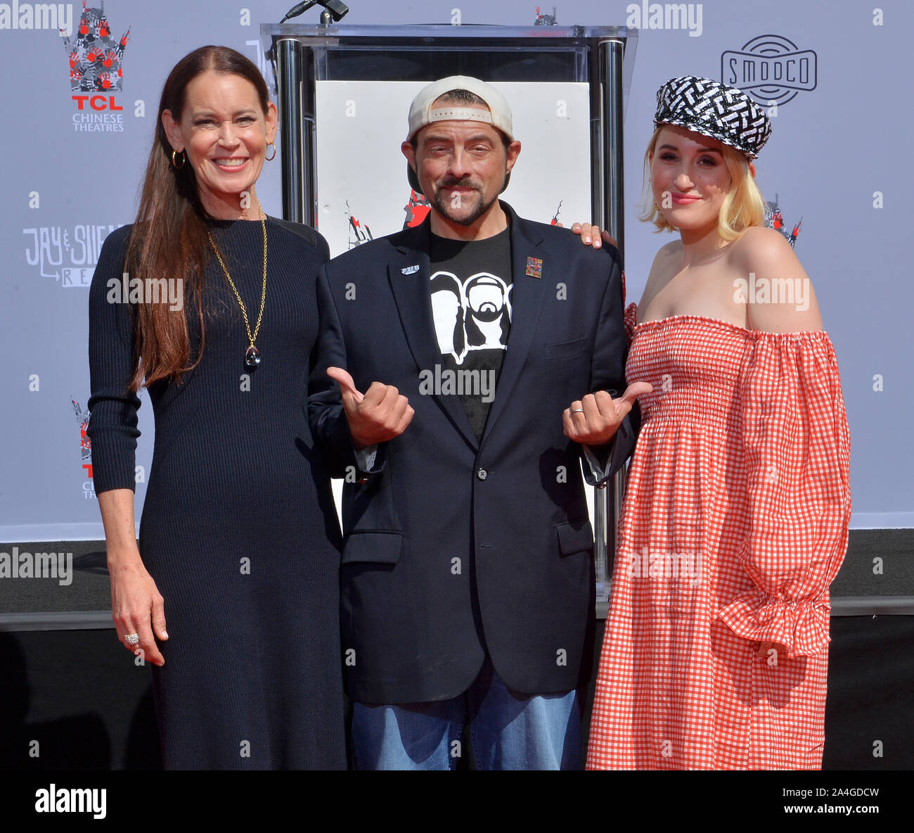 Los Angeles, United States. 14th Oct, 2019. Actor Kevin Smith (C) is joined by his wife Jennifer Schwalbach Smith (L) and their daughter Harley Quinn Smith during a hand and footprint ceremony immortalizing Kevin Smith and Jason Mewes in the forecourt of the TCL Chinese Theatre (formerly Grauman's) in the Hollywood section of Los Angeles on Monday October 14, 2019. Photo by Jim Ruymen/UPI Credit: UPI/Alamy Live News Stock Photo