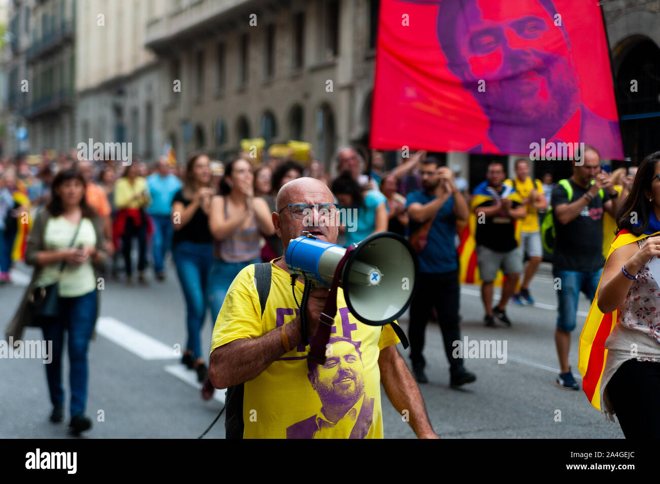 Barcelona, Spain - 14 october 2019: close up of old independentist protester marching  in laietana street against the prison sentence of catalan leade Stock Photo