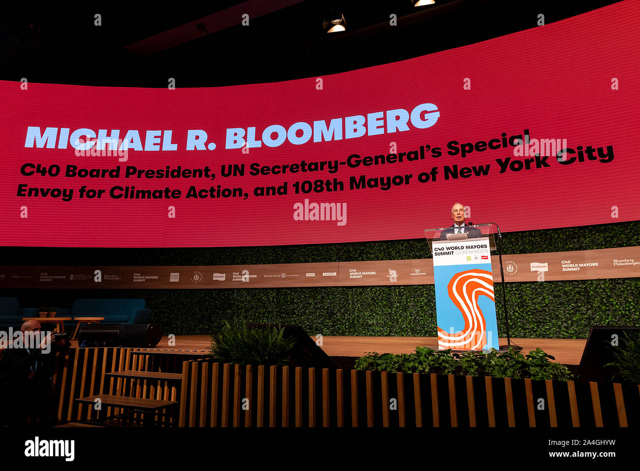 COPENHAGEN, DENMARK -  OCTOBER 10, 2019: Michael Bloomberg, President of the C40 World Mayors Board and former Mayor of New York City during the hand-over of the chair from Anne Hidalgo, Mayor of Paris, to Eric Garcetti, Mayor of Los Angeles, at the C40 World Mayors Summit in Copenhagen. More than 70 mayors of some of the world’s largest and most influential cities representing some 700 million people meet in Copenhagen from October 9-12 for the C40 World Mayors Summit. The purpose with the summit in Copenhagen is to build a global coalition of leading cities, businesses and citizens that rall Stock Photo