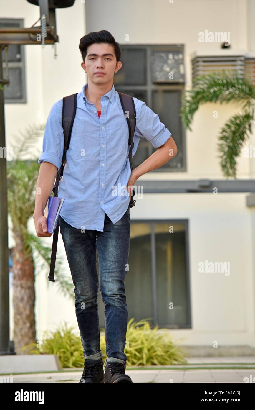 Serious University Minority Student Walking On Campus Stock Photo - Alamy