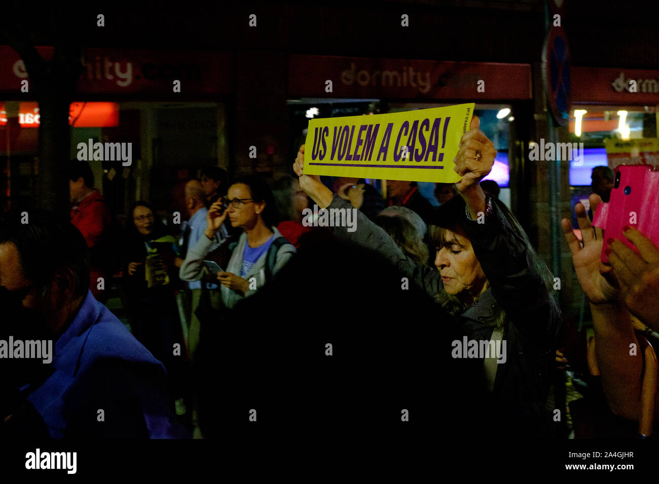 Sant Cugat Del Valles, Spain. 14th Oct, 2019. Us volem a casa! We want you home - in Catalan. More than 4000 people take to the streets of Sant Cugat del Valles, a town outside Barcelona, to protest the heavy sentences handed down by Spanish Supreme Court to Catalan politicians for alleged sedition, including local resident Raul Romeva, on October 14 2019, following the October 1 2017 independence referendum. Protests took place all across Catalonia today, including blocking of major road and rail routes, and the city's airports, following the ruling. Credit: deadlyphoto.com/Alamy Live News Stock Photo