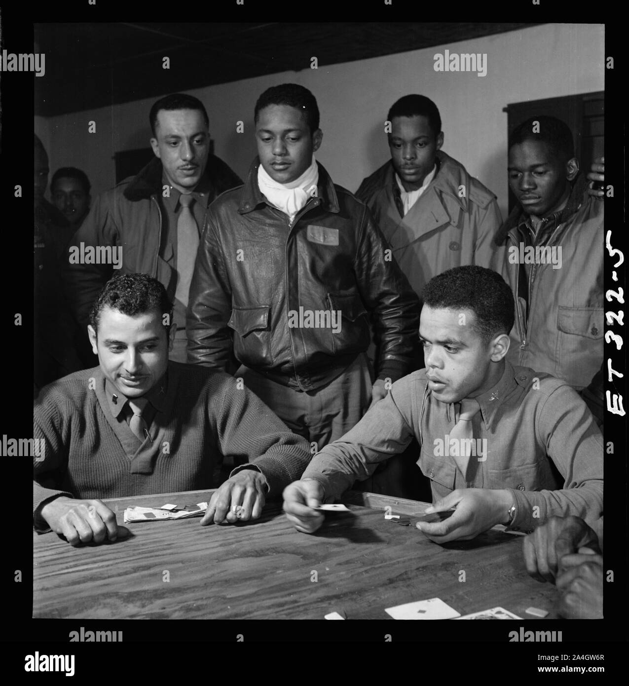 Tuskegee Airmen Playing Cards In Officers' Club, Left To Right: Walter M. Downs, New Orleans, LA, Class 43-B And William S. Price, III, Topeka, KS, Class 44-C, Ramitelli, Italy, Toni Frissell, March