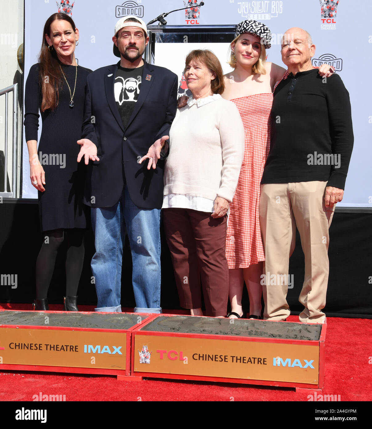 Los Angeles, USA. 13th Oct, 2019. Jennifer Schwalbach Smith, Kevin Smith, Harley Quinn Smith. Kevin Smith And Jason Mewes Hands And Footprint Ceremony held at TCL Chinese Theatre. Photo Credit: Birdie Thompson/AdMedia /MediaPunch Credit: MediaPunch Inc/Alamy Live News Stock Photo