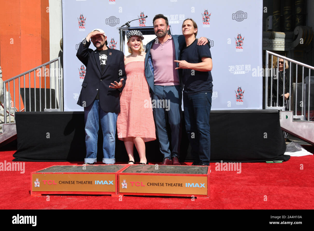 Los Angeles, USA. 13th Oct, 2019. Kevin Smith, Harley Quinn Smith, Ben Affleck, Jason Mewes. Kevin Smith And Jason Mewes Hands And Footprint Ceremony held at TCL Chinese Theatre. Photo Credit: Birdie Thompson/AdMedia /MediaPunch Credit: MediaPunch Inc/Alamy Live News Stock Photo