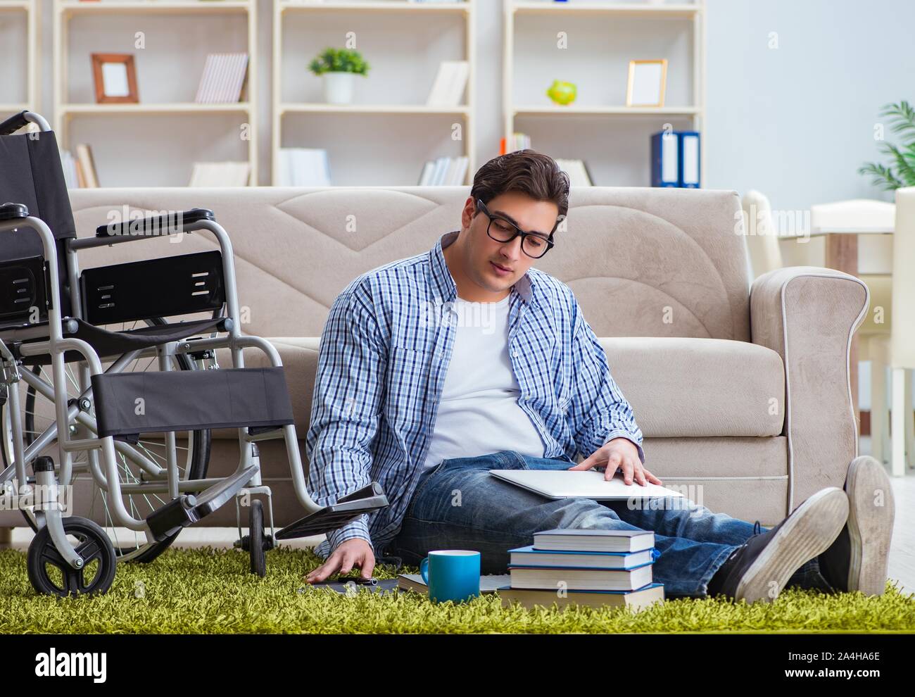 The young student studying at home Stock Photo - Alamy
