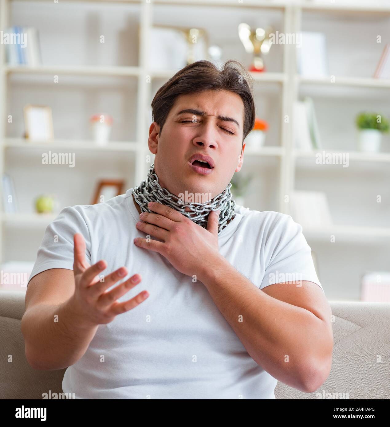The young man suffering from sore throat Stock Photo Alamy