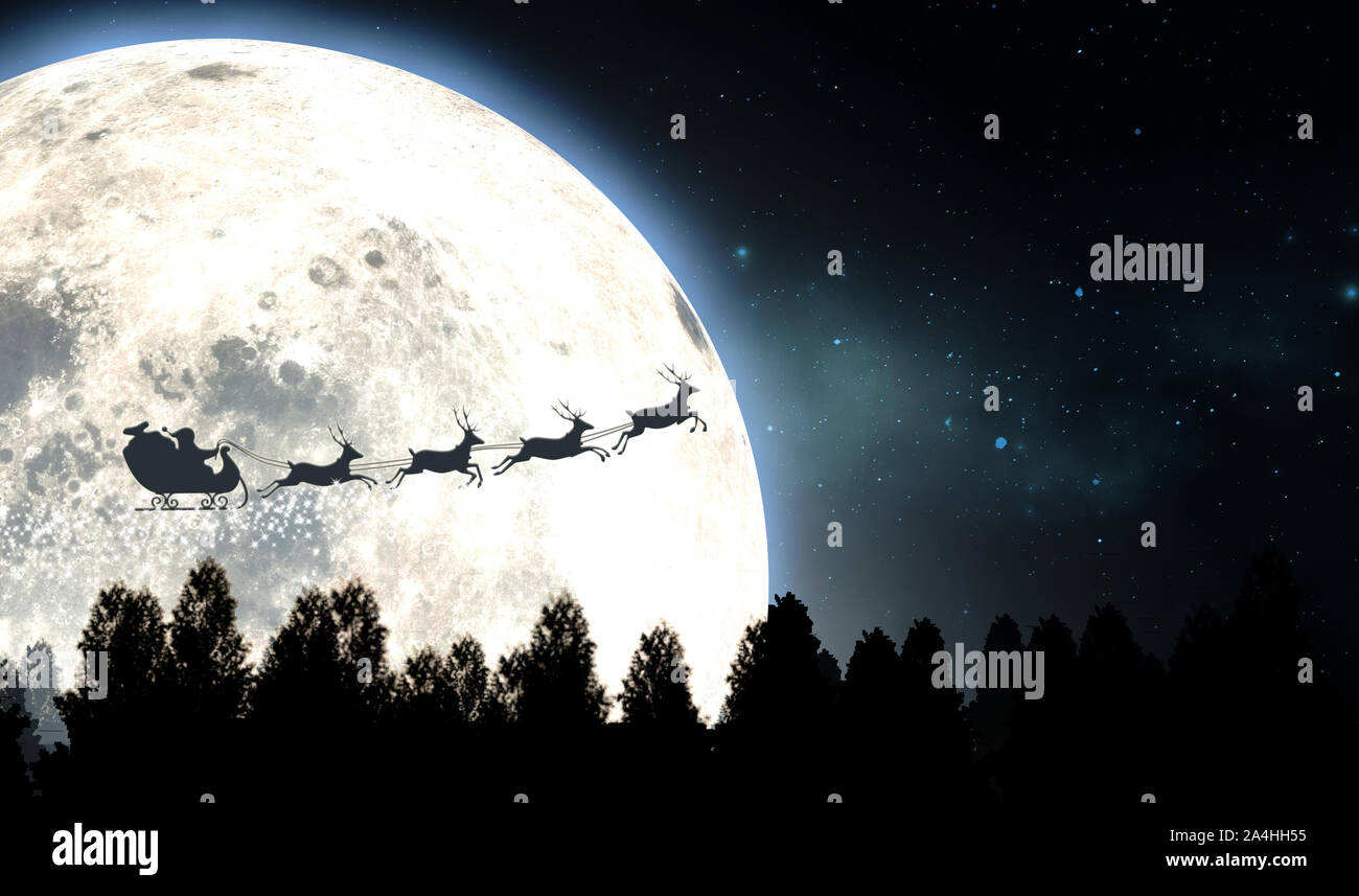 Santas sleigh silhouetted against the backdrop of a full moon and night ...