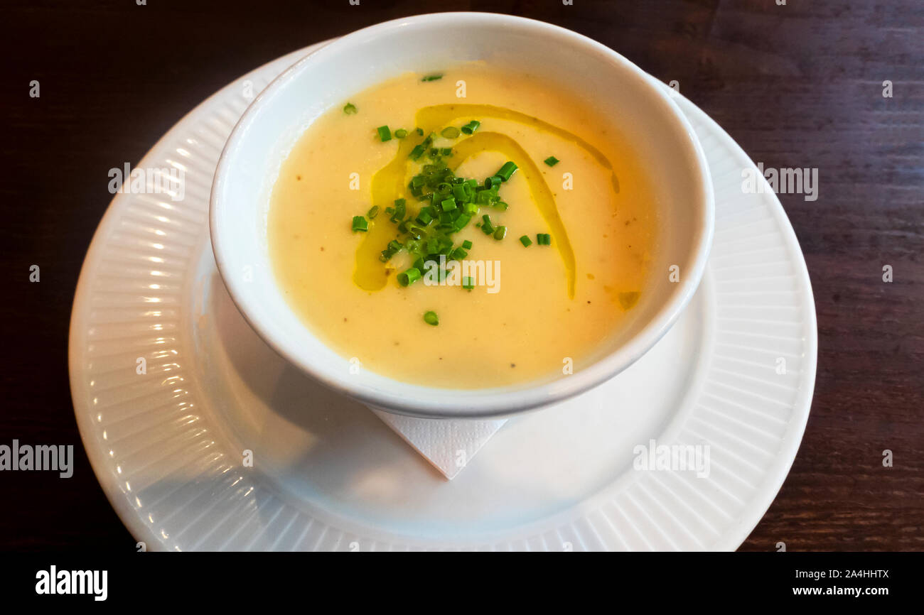 Leek and potato creamed soup with chives Stock Photo