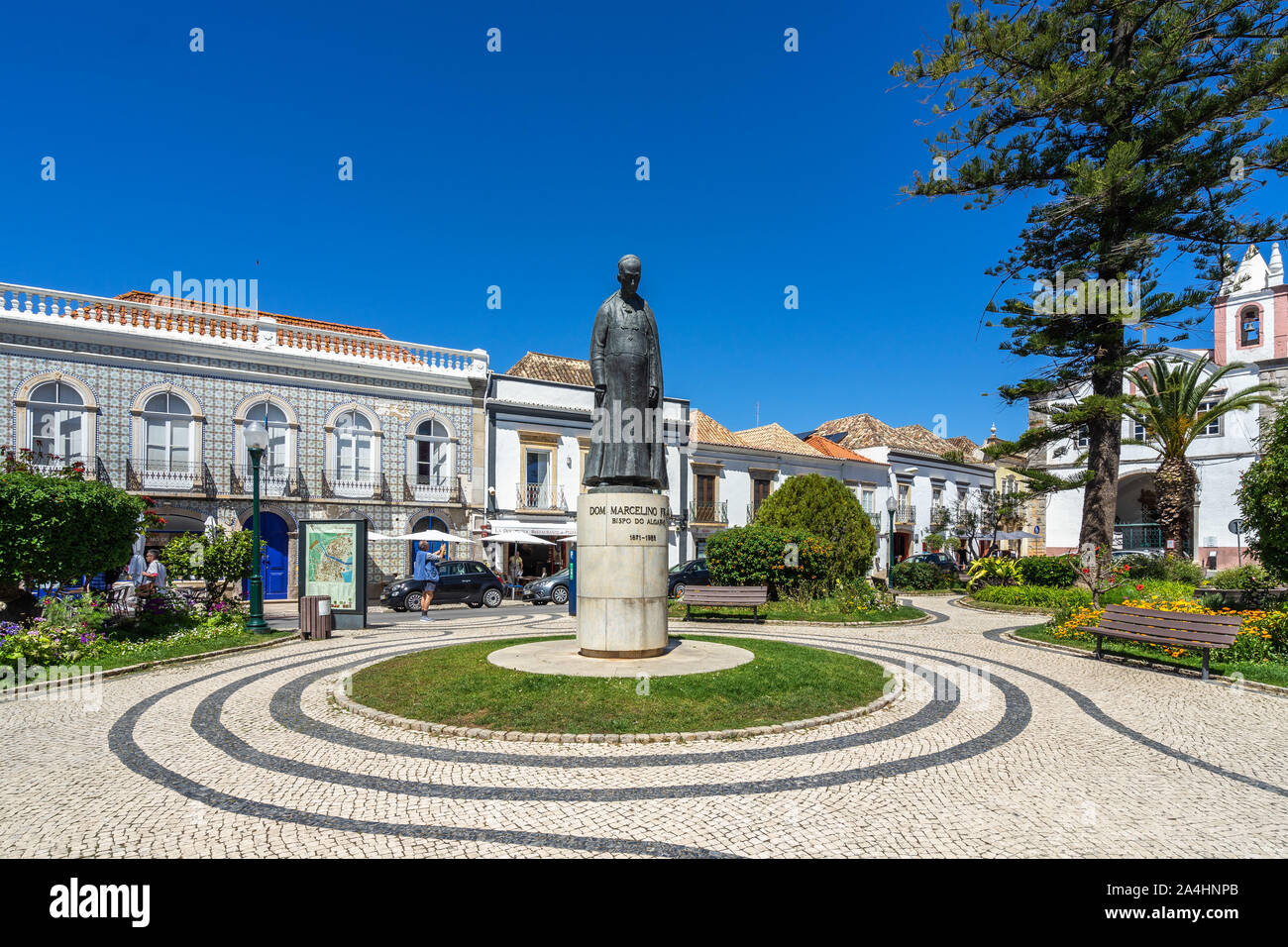 Nice square with gardens in Tavira old town. Tavira, Algarve, Portugal, April 2019 Stock Photo