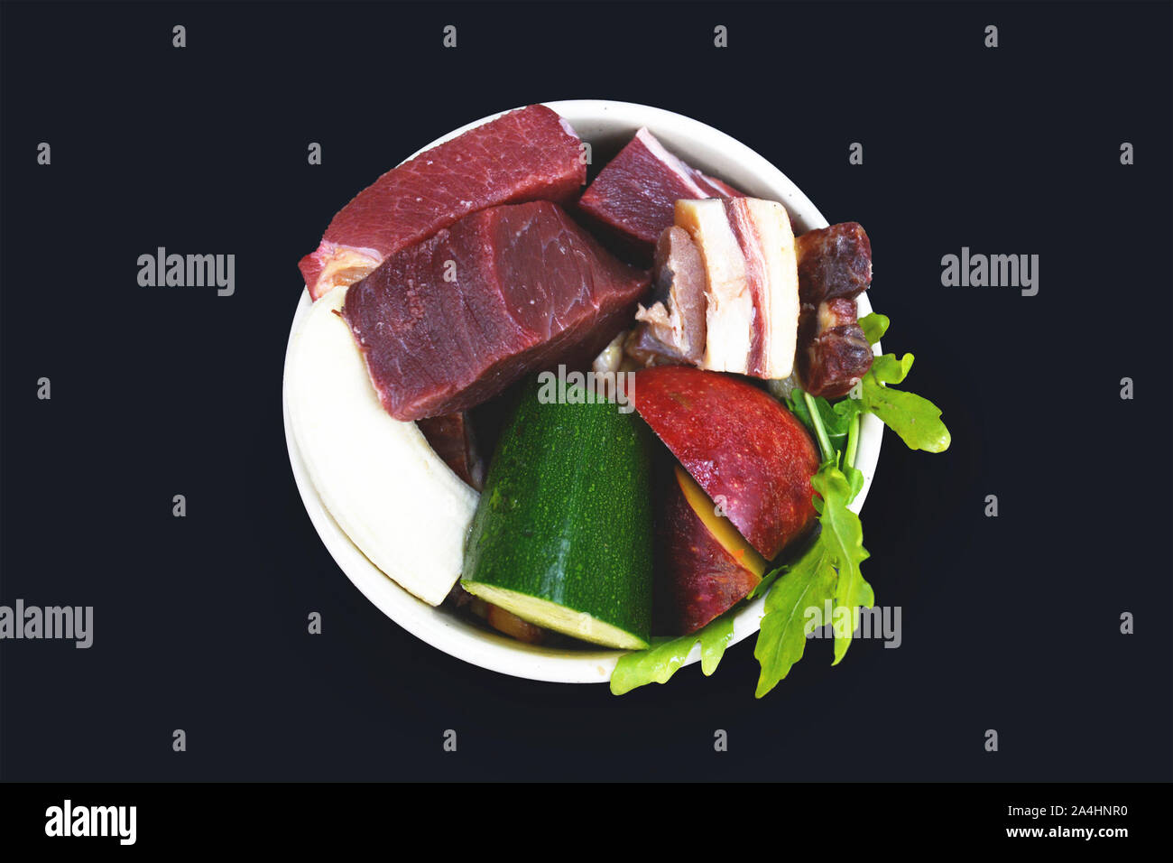 Top view of dog filled with mixture of biologically appropriate raw