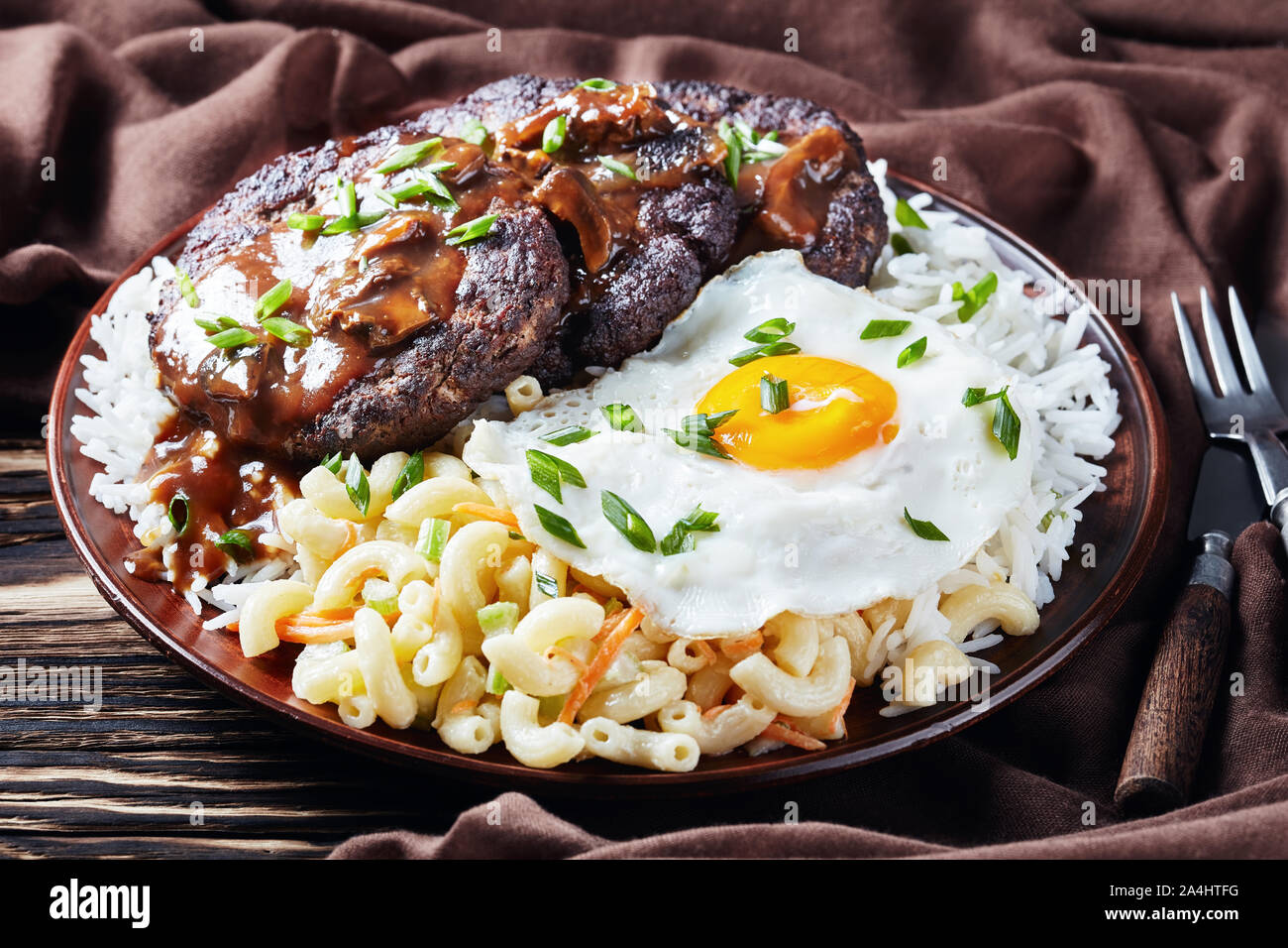 Loco Moco, Hawaiian Gravy Burger on Rice, and macaroni salad topped