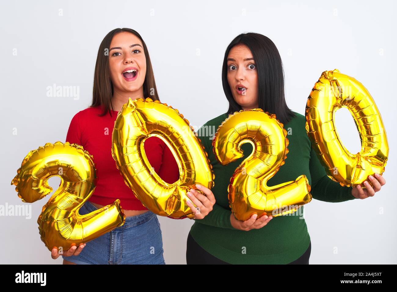 Young beautiful women smiling happy and confident celebrating new year ...