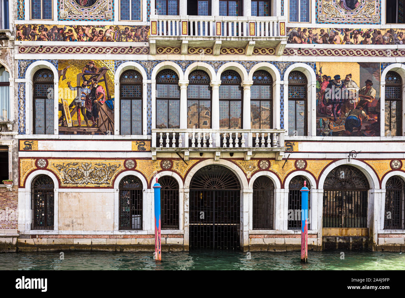 Venice, Italy - July 30 2019: Stunning mural paintaings and fresco ornate  the facade of a traditional Venetian master house by a canal in Venice  Stock Photo - Alamy, image size:1300x956
