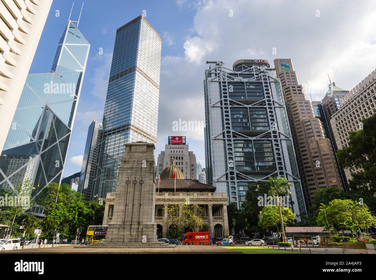 Hong Kong, China - May 27 2019: Modern skyscrapers of major banks such as HSBC and Bank of China contrast with colonial buildings, the Cenotaph and th Stock Photo