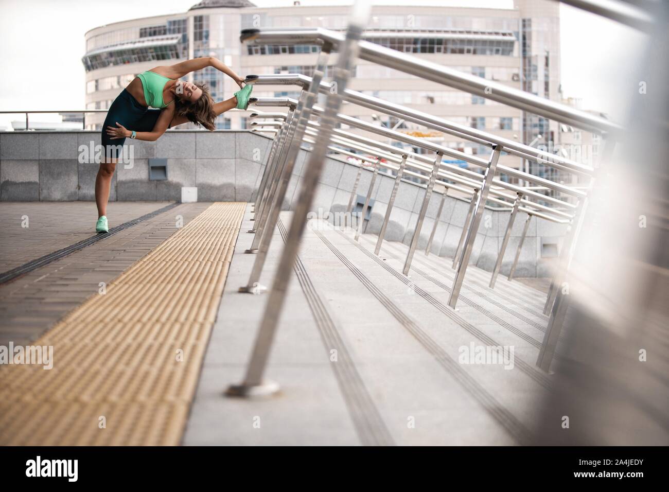 Female Runner Resting Stretching Leg Hi Res Stock Photography And