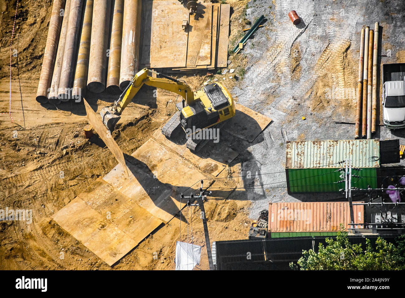 Aerial view of site preparation, site clearance, ground works and foundation stage. Stock Photo