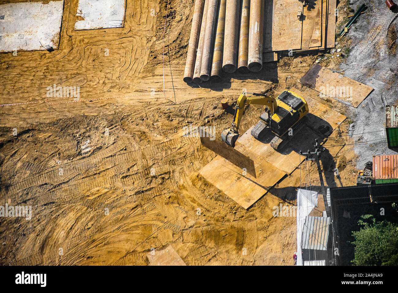 Aerial view of site preparation, site clearance, ground works and foundation stage. Stock Photo