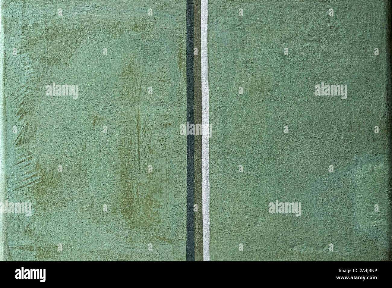 texture plasterd house wall painted in sponge technique, green with gray and white stripes, Stock Photo