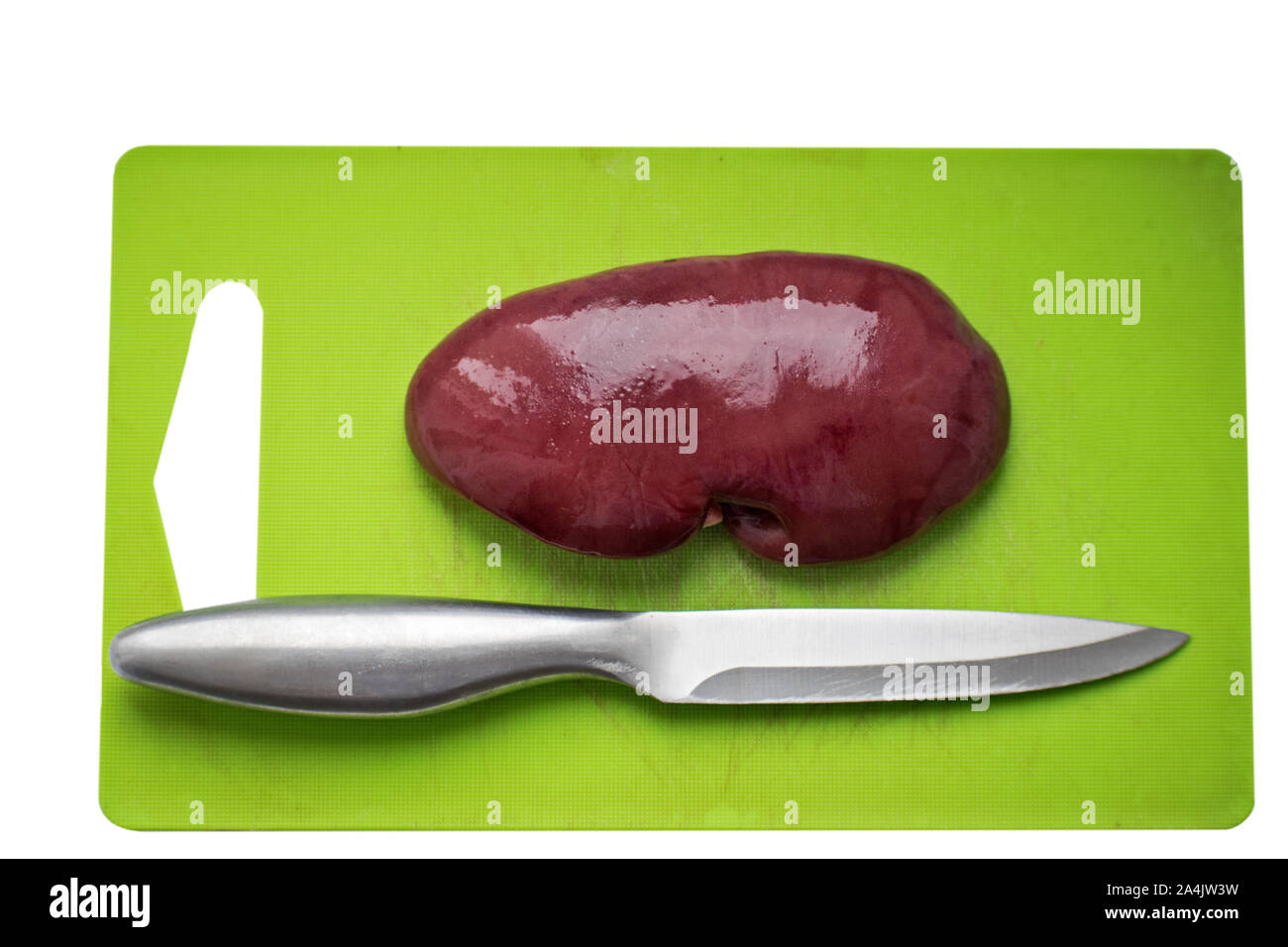 Fresh pork kidney on a cutting board. Stock Photo