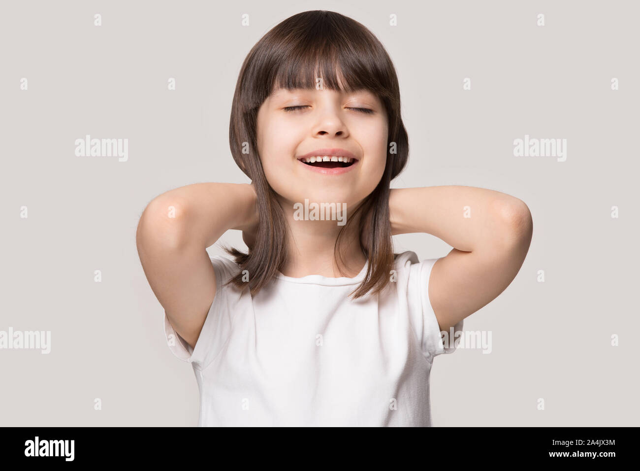 Happy small girl smile breathing good fresh smell Stock Photo