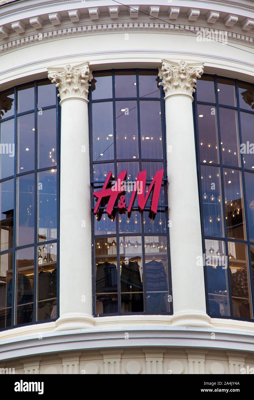 An HM shop (Hennes and Mauritz). Hennes & Mauritz AB is a Swedish  multinational clothing-retail company known for its fast-fashion clothing  for men, women, teenagers and children. Here in Nice, France.Photo Jeppe