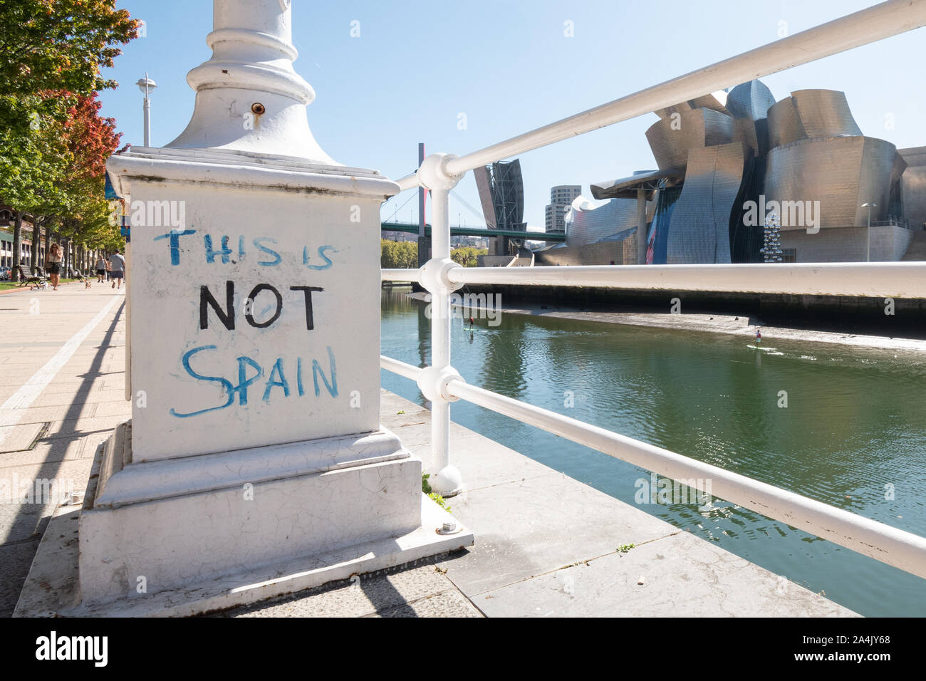 Basque Independence graffiti 'This is Not Spain' on lamp post opposite the Guggenheim Museum, Bilbao, Basque Country, Spain, Europe Stock Photo