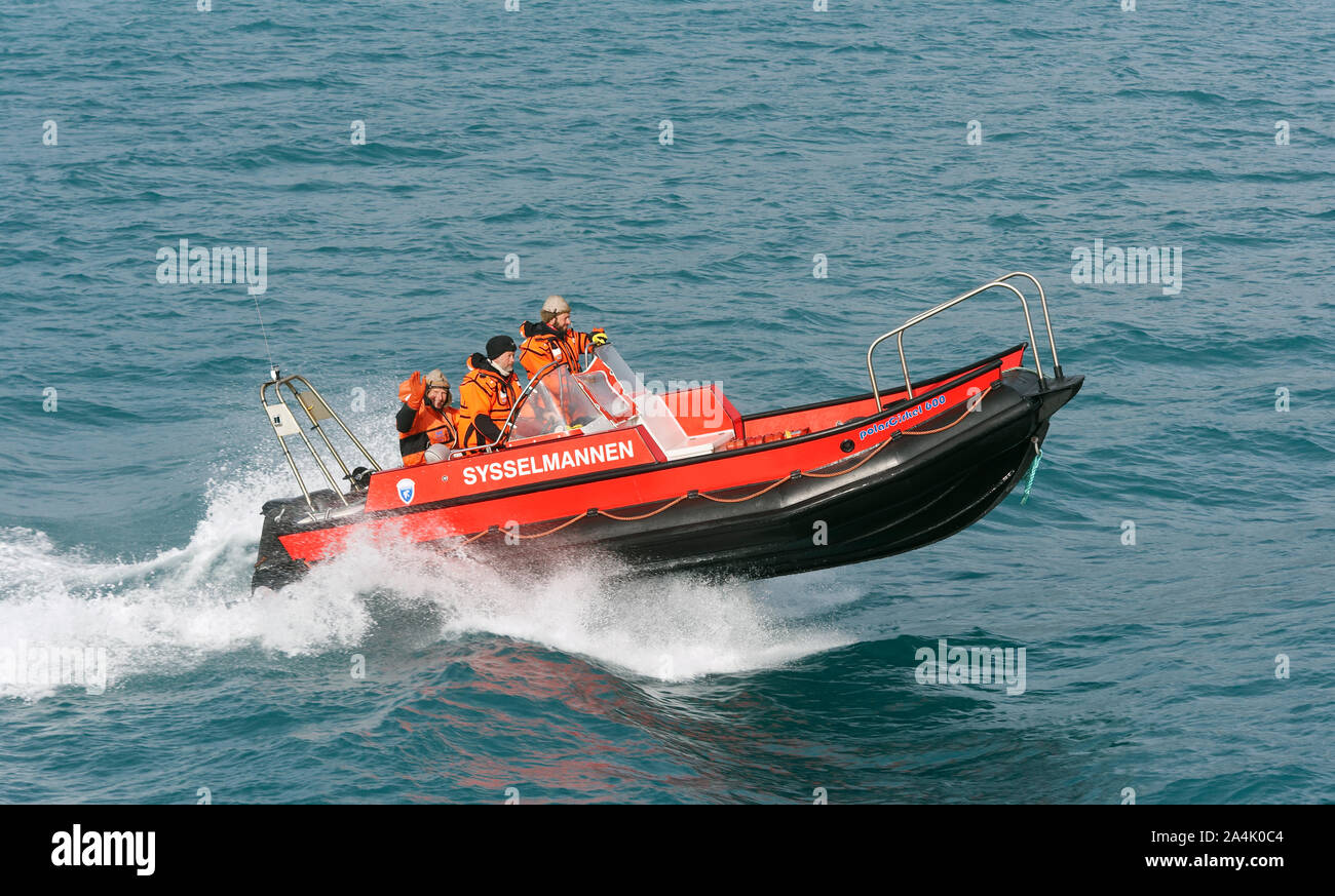 District governor (of Svalbard) on patrol in speedboat Stock Photo Alamy