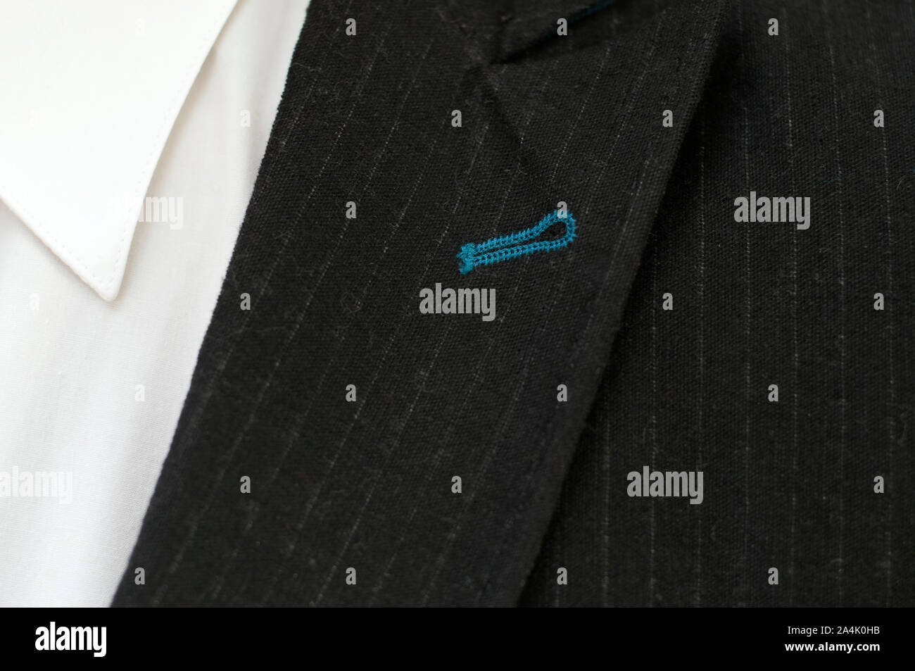 Shirt collar and buttonhole on lapel Stock Photo Alamy