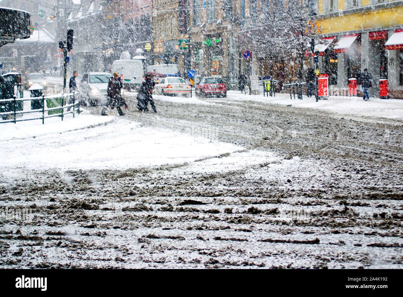 Snowing - bad weather conditions in Oslo, Norway - slushy roads Stock Photo  - Alamy