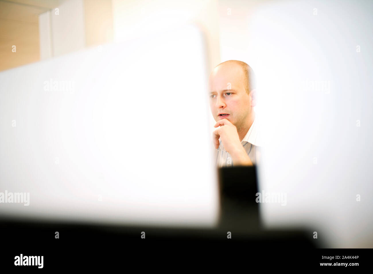 Young man in workplace Stock Photo