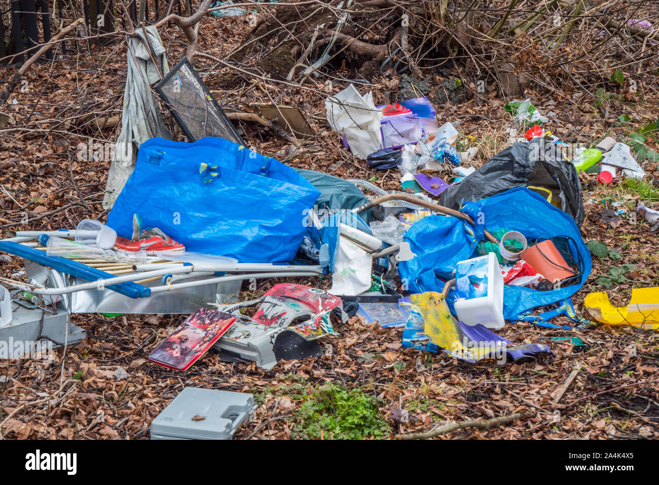 Garbage dump in the forest Environmental pollution Stock Photo - Alamy