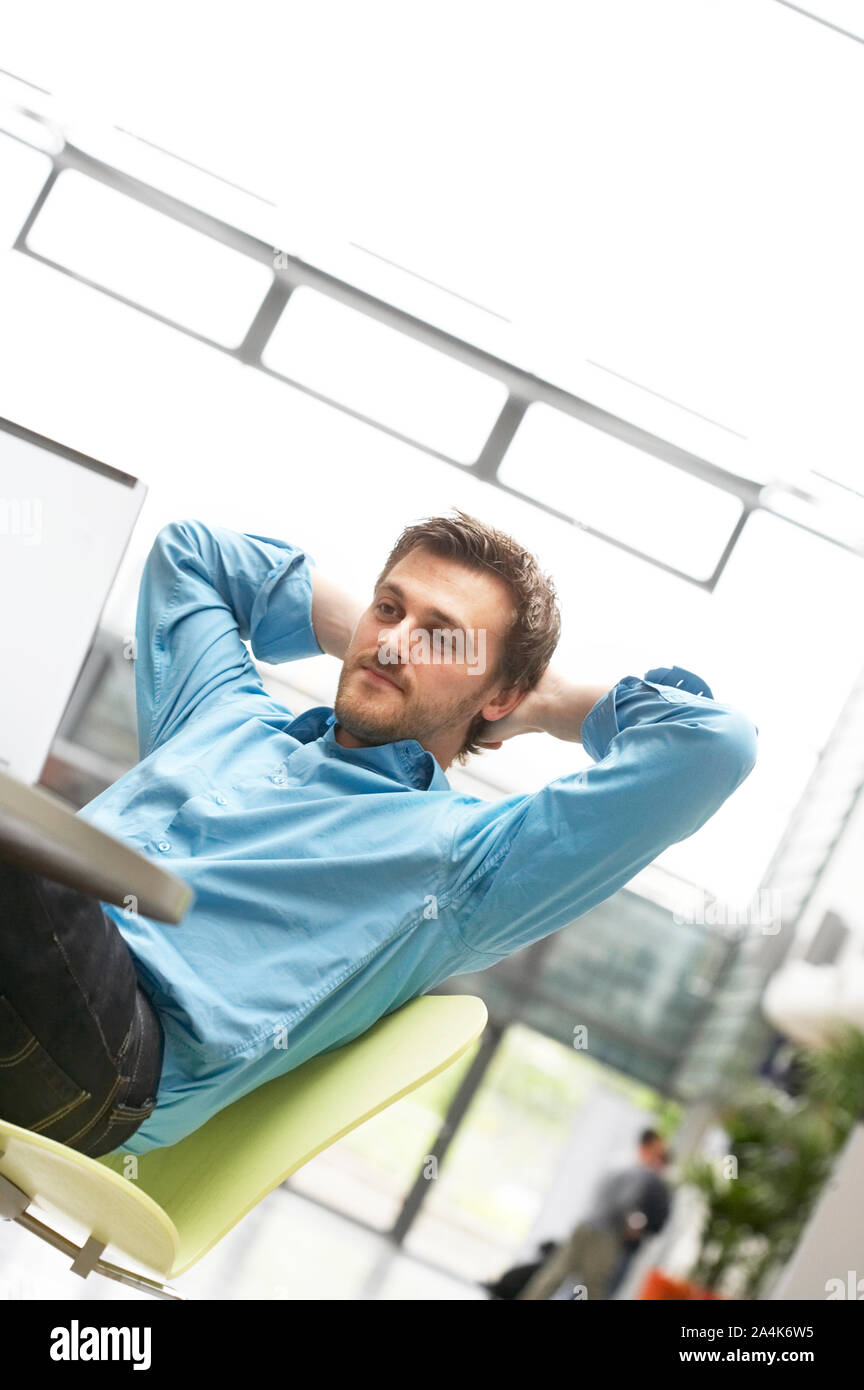 Young man in workplace Stock Photo